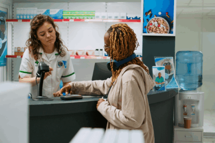 Dis-Chem cashier assisting a customer