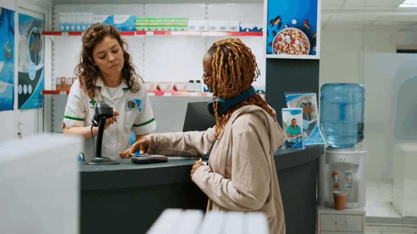 Dis-Chem cashier assisting a customer